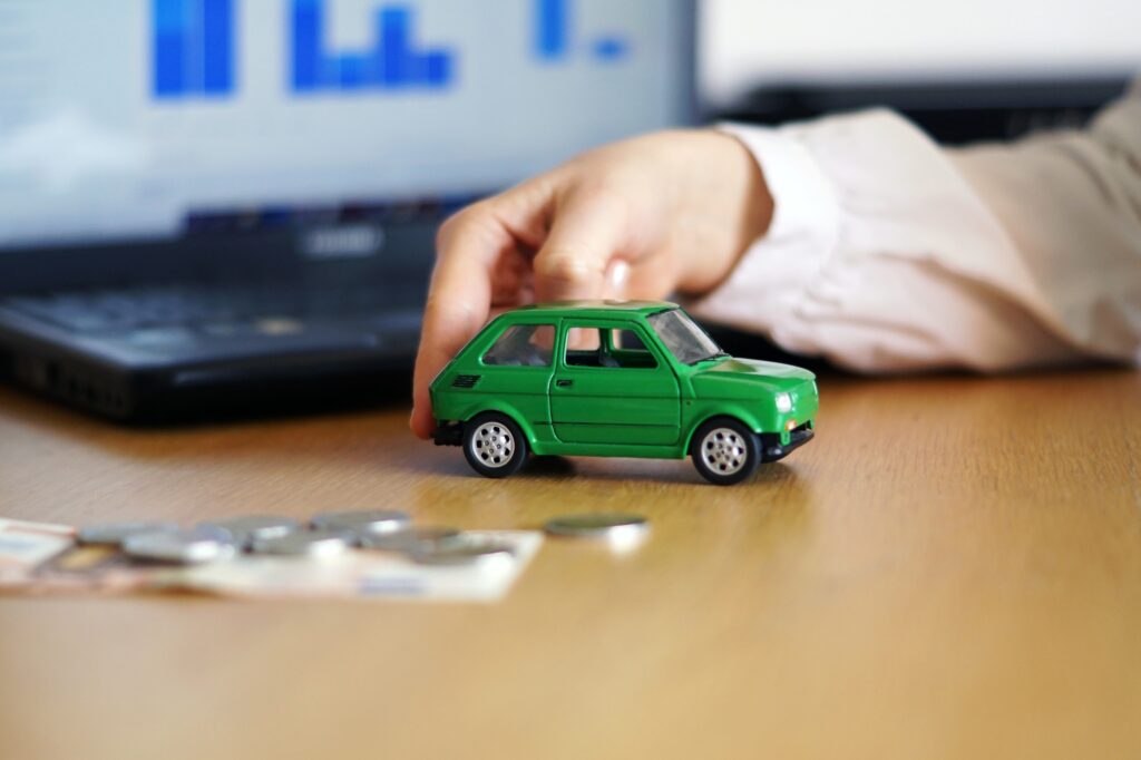 closeup shot person thinking buying new car selling vehicle